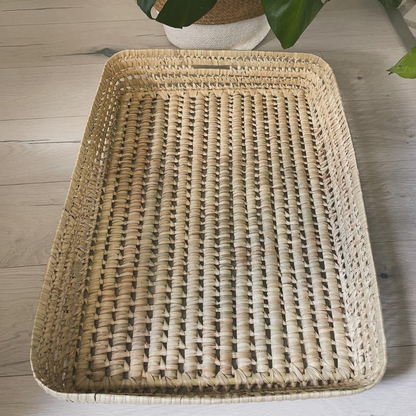 Panier à langer bébé en feuilles de palmier tressées